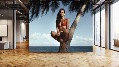 Summer Lifestyle Full Body Portrait of Tanned Bikini Girl Model in Red Wall mural