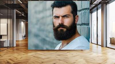 A man with a beard and mustache standing against the wall Wall mural