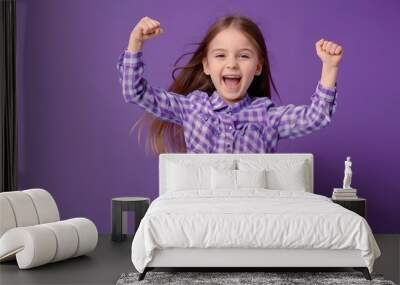 Full size photo of nice young girl jump raise fists wear on purple background Wall mural