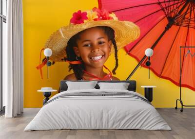 Happy African-American girl with beach accessories and umbrella on yellow background Wall mural