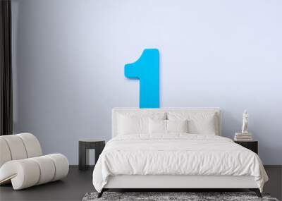 Wooden number 1 with blue color on white background. Wall mural