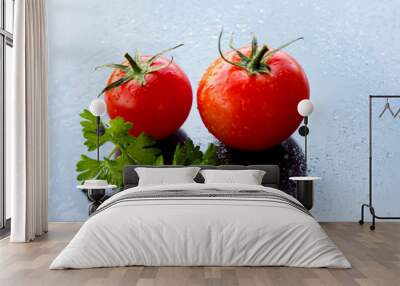 two tomatoes on white wooden table Wall mural