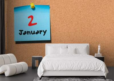 January 2nd. Day 2 of month. Calendar on notice board. Winter time. Empty space for text Wall mural