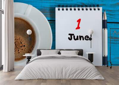 June 1st. Image of june 1, calendar on blue background with morning coffee cup. First summer day. Empty space for text. Happy Childrens Day Wall mural