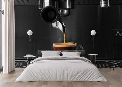 Hot coffee flow to a cup on espresso machine Wall mural