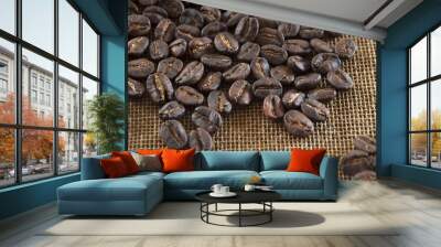 Coffee of Guatemala on grunge wooden background. roasted coffee beans on the table in perspective. Wall mural