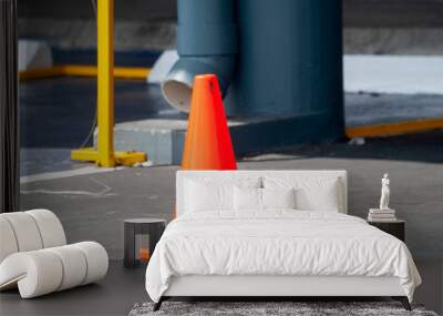 Cone signage in parking area in shopping center, reserved and empty.

 Wall mural