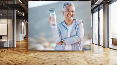 Fitness, happy or old woman with water bottle in nature to start training, exercise or hiking workout in New Zealand. Portrait, liquid or healthy senior person smiles with pride, goals or motivation Wall mural