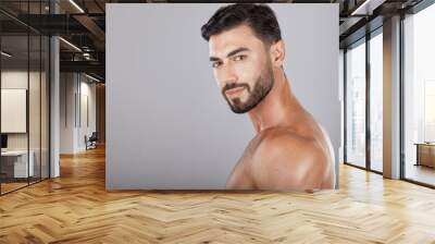 Man, studio portrait and skincare with beauty, cosmetics and wellness by studio backdrop with natural glow. Model, self care and healthy aesthetic for cosmetic self love, body care and radiant facial Wall mural