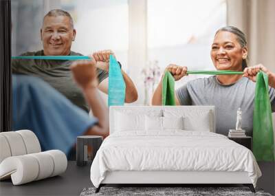 Physical therapy, stretching and senior couple with nurse teamwork, support and help in rehabilitation together. Elderly black people or friends smile with band in physiotherapy with strong progress Wall mural