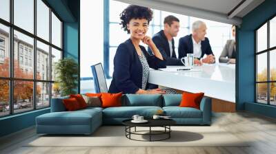 Woman, boardroom and happy in meeting on portrait in confidence for planning and brainstorming. Female person, employee and smile with pride at office for teamwork or collaboration on strategy Wall mural