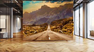 Image related to unexplored road journeys and adventures.Road through the scenic landscape to the destination in Tenerife natural park. Wall mural