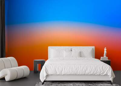 Abstract blur orange and blue gradient bakcground Wall mural