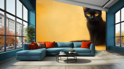 Black cat with striking yellow eyes on golden background, artistic portrait. Mystical and serene concept Wall mural