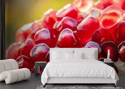 Close-up of pomegranate seeds in sunlight, vibrant macro. Healthy eating concept Wall mural