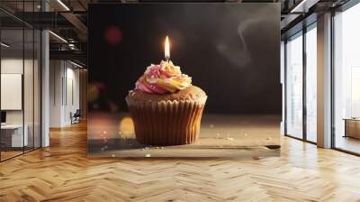 Cupcake with icing and frosting and with a burning birthday candle. Generative ai Wall mural