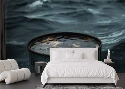 rusty barrel floating in stormy sea, environmental pollution concept Wall mural