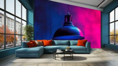 Vintage hanging lamp with vibrant pink and blue lighting, artistic background. Modern interior design concept Wall mural