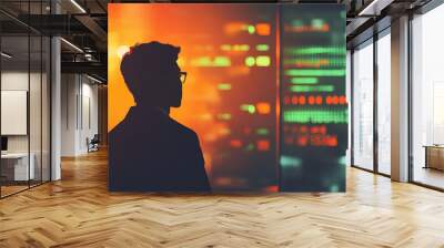 A silhouette of a trader in an office, captured with a bokeh effect in a low-lit environment Wall mural