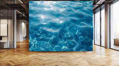 A transparent blue water surface texture shimmers with ripples, splashes, and bubbles, capturing the essence of summer Wall mural