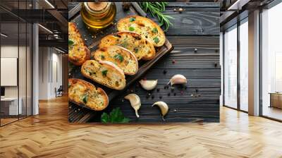 Composition with slices of toasted garlic bread, spices and oil on dark wooden background Wall mural