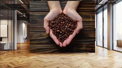 hands holding roasted brown specialty coffee close-up Wall mural