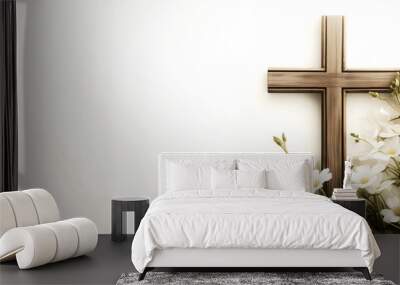 Composition with a Christian wooden cross and flowers against muted white background with copy space for text. Funeral template Wall mural