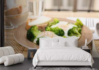 breakfast of crumpled eggs with broccoli Wall mural