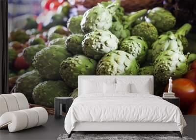 Fresh artichokes on market counter Wall mural