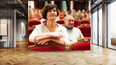 mature man and woman in theater watching a performance Wall mural