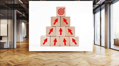 Arrow icons and target icon on wooden cubes. Financial growth, goal achievement or career development concept in business management. Wall mural