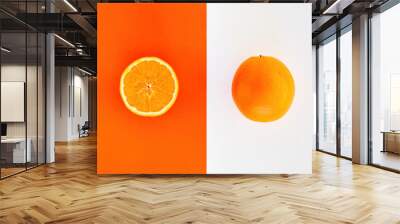 One whole and one halved slice of orange comparison Wall mural