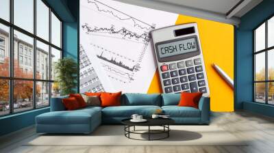 the word cash flow on calculator display screen with business office desktop. to calculate or analyz Wall mural