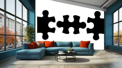 three different black puzzle pieces Wall mural