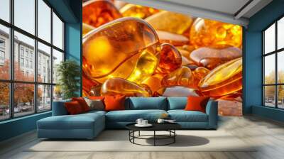 Transparent, amber-colored resin material in various shapes and sizes, forming a sleek and glossy background. Wall mural