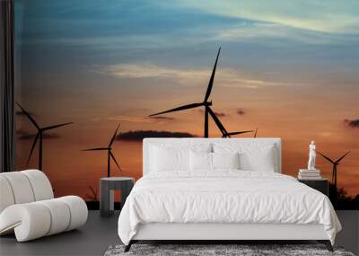 Wind turbines silhouette at sunset Wall mural