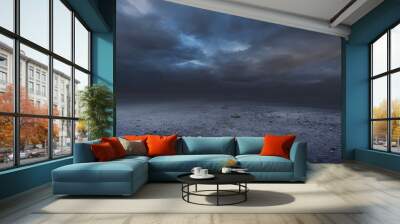 Surreal gravel dark background with dramatic sky Wall mural