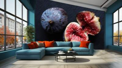 An open fresh red fig and a closed one on slate background for food illustrations Wall mural