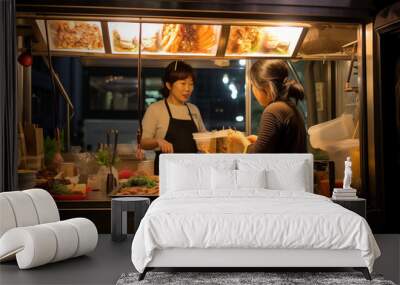 Happy asian chef  working in harmony in a food truck kitchen. Wall mural