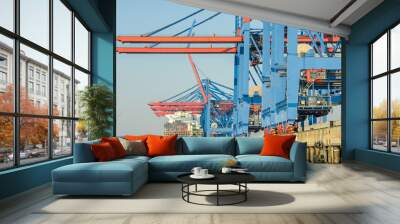 Harbour facilities, container terminal and large container vessel in Hamburg, Germany Wall mural