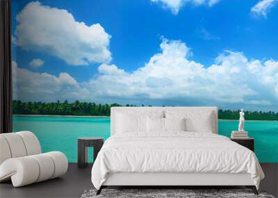 Clear Tropical Water in Paradise with blue sky Wall mural