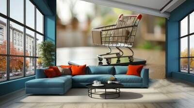 Mini Shopping Cart on Smartphone . Concept of Online Shopping. Wall mural