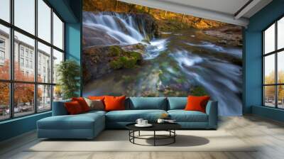 Beautiful waterfalls and mountain stream in Transylvania, in early spring Wall mural