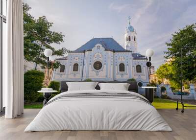 The blue church in Bratislava. Saint Elizabeth church view from the side trough the park. Wall mural