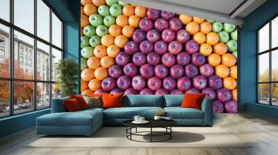 geometrically arranged red apples, oranges and green apples Wall mural