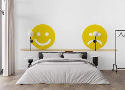 Smiley face and sad face on scale - Concept of balance between happiness and sadness Wall mural