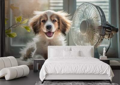 A cute happy dog sits by a fan on a hot summer day. A puppy's fur blows in the breeze as it cools off from the heat. Wall mural