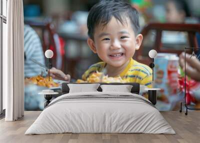 A Chinese child enjoying a meal with family, celebrating a holiday Wall mural