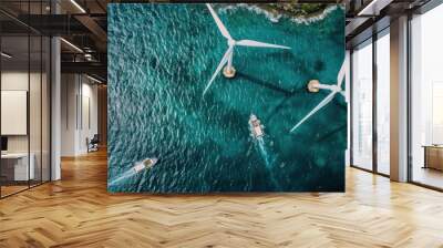 Aerial view of offshore wind turbines with boats nearby Wall mural