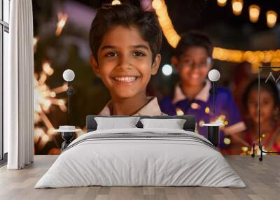 An Indian teenager celebrating Diwali with family, holding sparklers and smiling brightly Wall mural